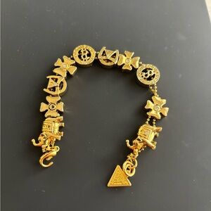 GUESS Lucky Charm Bracelet Gold Tone Fashion Jewelry